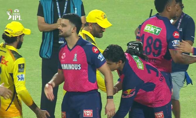 Suryavanshi touches Dhoni's feet after stellar knock