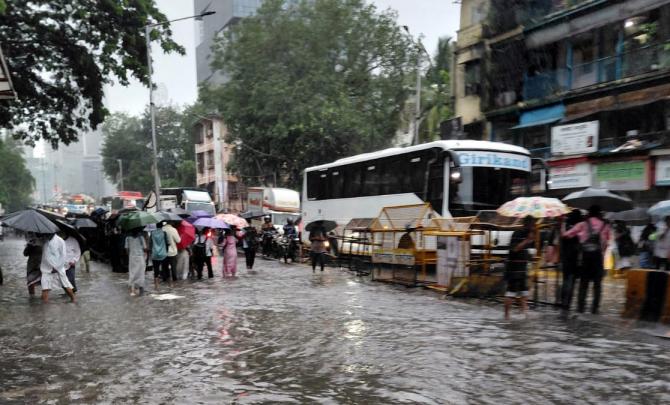 Rains pound Mumbai; local trains hit, govt offices shut