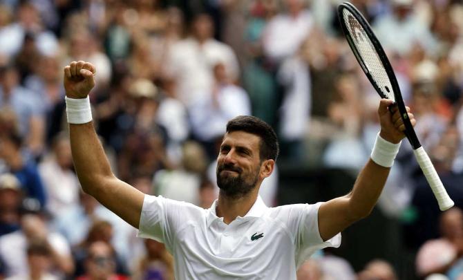 PIX: Djokovic grinds past Di Minaur to reach quarters
