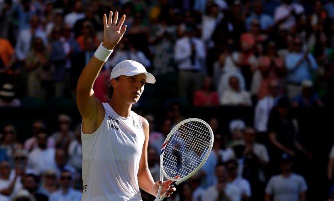Sizzling Swiatek storms into maiden Wimbledon final