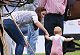 PHOTOS: Britain's Prince George takes first step towards the throne