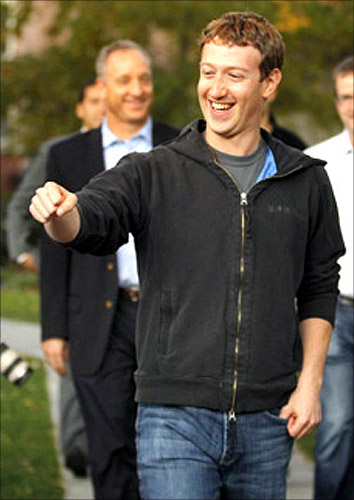 Mark Zuckerberg fist bumps a student at Harvard University in Cambridge, Massachusetts.