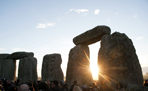 People attend the annual summer solstice at the Stonehenge monument on Salisbury Plain in Wiltshire, southern England.