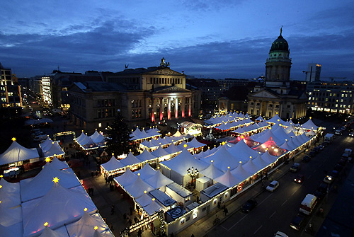 A general overview shows the Gendarmenmarkt Christmas market in Berlin's Mitte district.