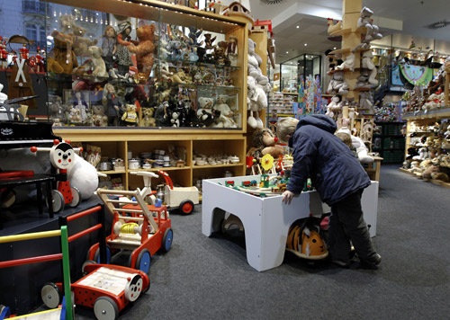 A boy looks at toys in Serneels toy shop in Brussels.