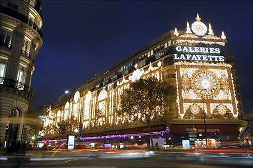 View of the Galeries Lafayette department store with Christmas lights in Paris.