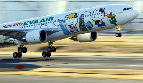 Eva Airways aircraft painted with Hello Kitty characters takes off at Narita international airport.