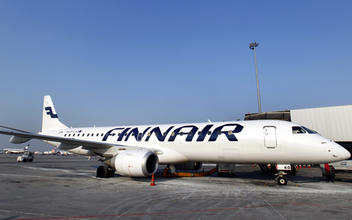 Finnair airplane is docked at the Chopin International Airport in Warsaw.