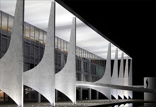 A security walks next to the Planalto Palace designed by Brazilian architect Oscar Niemeyer in Brasilia.