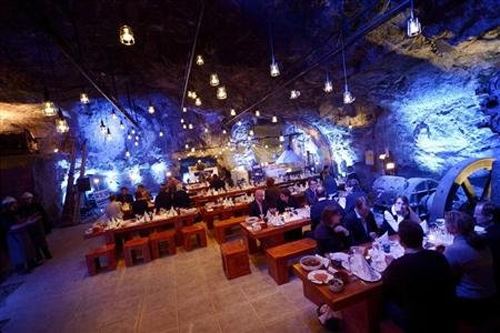 Customers eat their dinner at Muru Pop Down restaurant at Tytyri mine in Lohja.