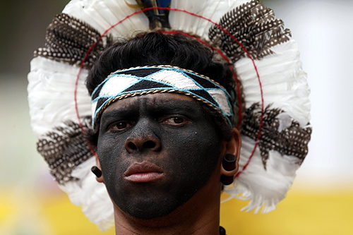 An indigenous man protests before the visit of FIFA Secretary General Jerome Valcke at Maracana Stadium in Rio de Janeiro.
