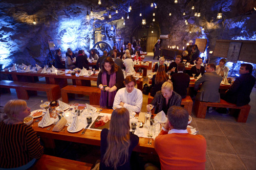 Customers eat their dinner at Muru Pop Down restaurant at Tytyri mine in Lohja.