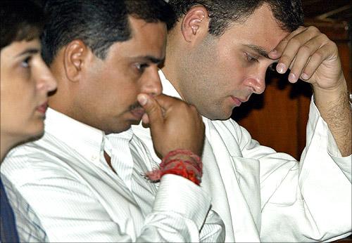 Rahul Gandhi (R) flanked by his brother-in-law Robert Vadra (C) and sister Priyanka Vadra.