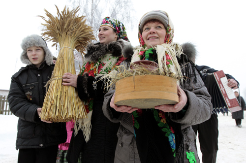 People take part in Kolyada holiday celebrations in Noviny, some 90 km (56 miles) east of the capital Minsk.