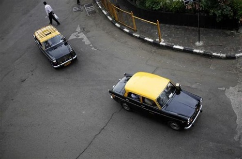 Sunset for Mumbai's famous black and yellow taxis