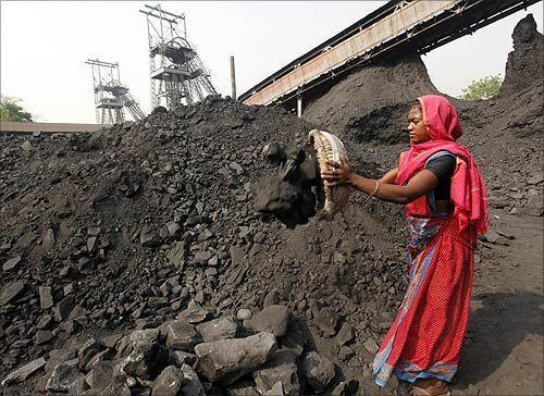 A labourer works at the Mahanadi coal fields at Dera, near Talcher town in Orissa.