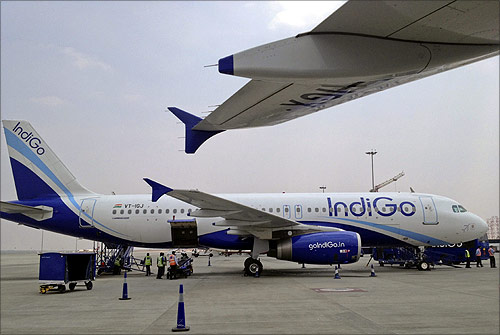 An IndiGo Airlines A320 aircraft is parked on the tarmac at Bengaluru International Airport.