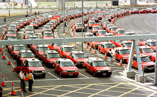 Hundreds of taxis wait for customers at Hong Kong's new international airport.