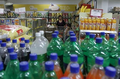A woman shops inside a food superstore in Ahmedabad.