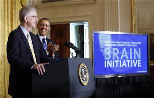 U.S. President Barack Obama is introduced by American physician-geneticist Francis Collins before his announcement of his administration's BRAIN (Brain Research through Advancing Innovative Neurotechnologies) initiative at the White House.