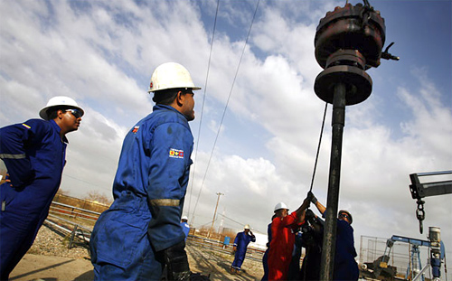 Workers in an oil field in Venezuela, one of the countries that experts say hold the oil supplies of the future.