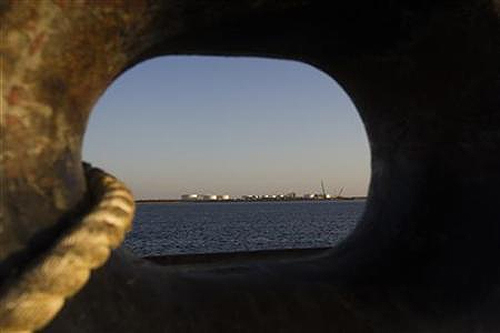 A general view of an oil dock is seen from a ship at the port of Kalantari in Chabahar, 300km (186 miles) east of the Strait of Hormuz.
