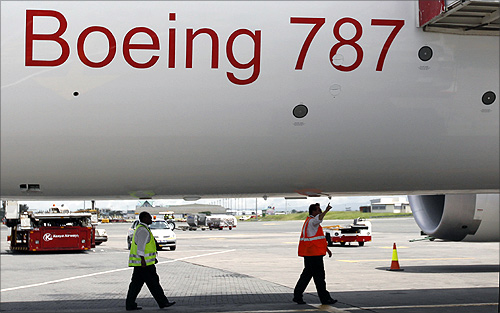 Aviation engineers inspect an Ethiopian Airlines' 787 Dreamliner after it arrived at the Jomo Kenyatta international airport in Kenya's capital Nairobi.
