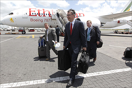 Randy Tinseth, vice president of marketing for Boeing commercial airplanes (front), walks from an Ethiopian Airlines' 787 Dreamliner after it arrived at the Jomo Kenyatta international airport in Kenya's capital Nairobi.