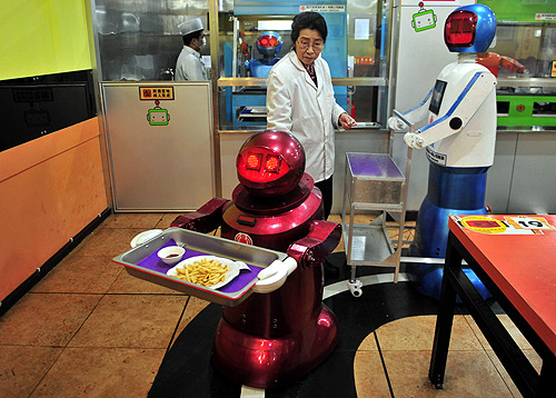 A restaurant where robots cook and serve food