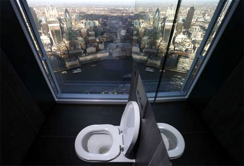 A toilet overlooking the financial district is seen in a restroom of The View gallery at the Shard, western Europe's tallest building, in London.