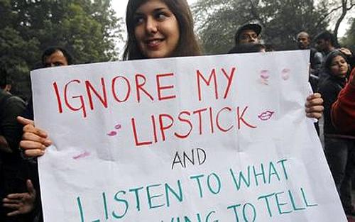  A demonstrator holds a placard as she takes part in a protest rally in New Delhi December 27, 2012. Photo: Mansi Thapliyal/Reuters