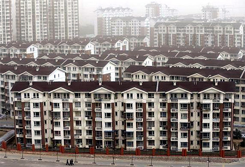 New apartment buildings, where the local government built homes for former miners and farmers as part of an urbanization program, are seen in Mentougou district, suburb of Beijing.