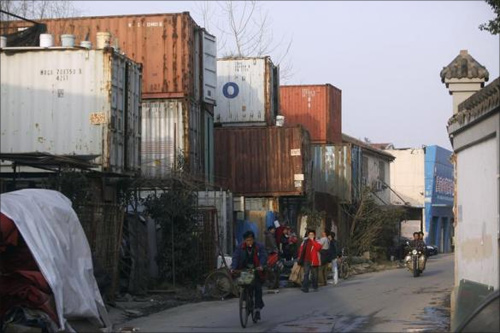 Families live in a shipping container!