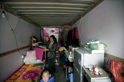 Families live in a shipping container!