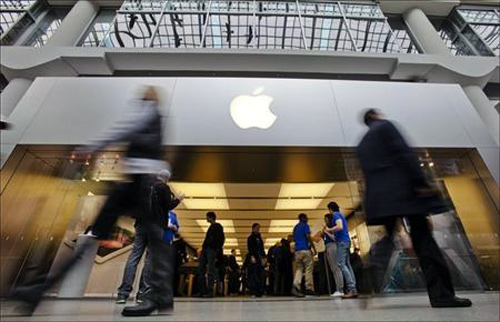 People walk by the Apple Store in the Eaton Centre shopping mall in Toronto.