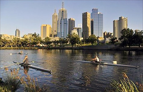 Rowers train at dawn on the Yarra River in Melbourne.