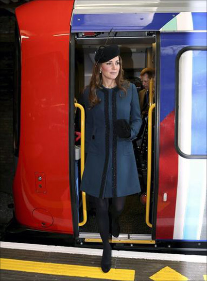 Britain's Catherine, Duchess of Cambridge inspects a tube train during her visit to Baker Street underground station.