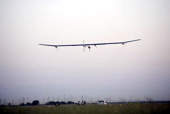 Solar Impulse aircraft takes off from Moffett Field to begin the first leg of its 2013 Across America Mission in Mountain View, California.