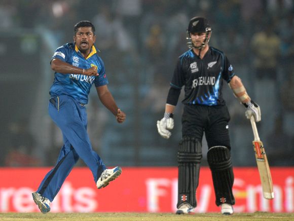 Rangana Herath celebrates after picking a wicket