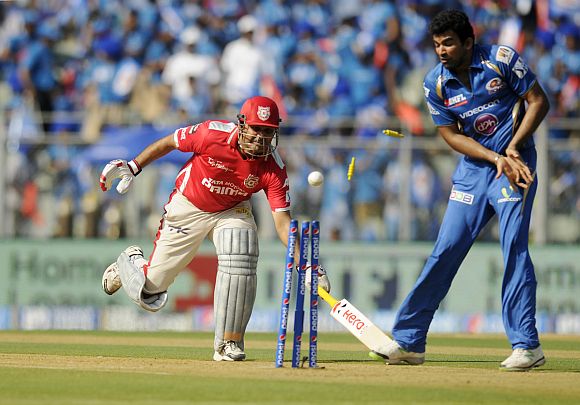 Virender Sehwag is run-out by Rohit Sharma