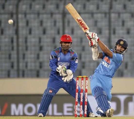 Shikhar Dhawan hits one for a boundary
