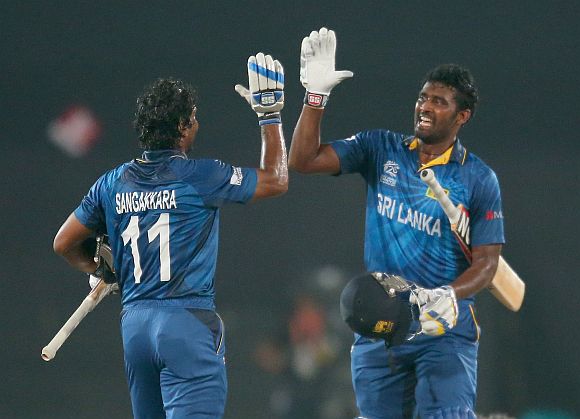 Kumar Sangakkara and Thisara Perera celebrate after winning the game