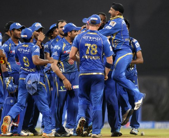 Harbhajan Singh celebrates with his Mumbai teammates
