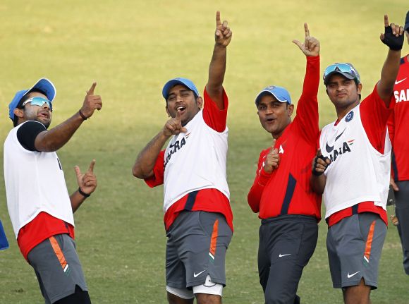 Mahendra Singh Dhoni and his India teammates