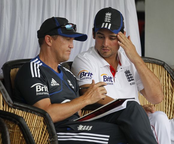 Andy Flower, then the English coach, and skipper Alistair Cook.
