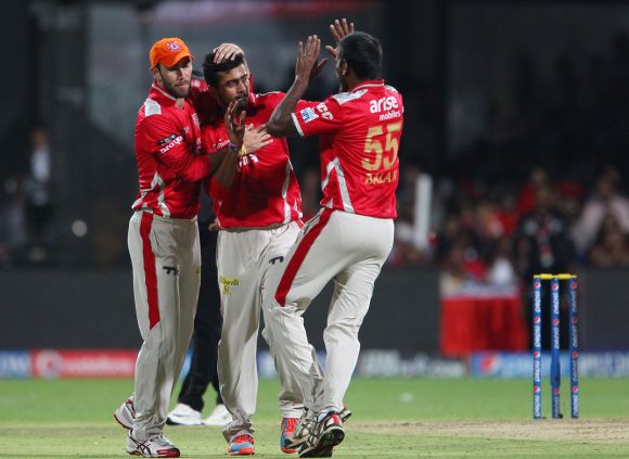 Shivam Sharma celebrates after picking a wicket