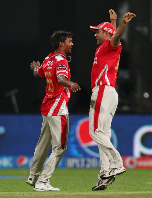 Sandeep Sharma celebrates after picking up wicket