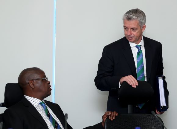 Peter Chingoka, chairman of Zimbabwe Cricket, chat with David Richardson, Chief Executive of the ICC. 