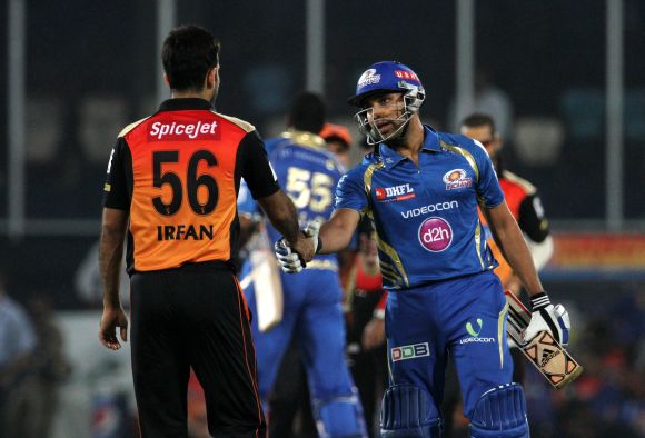 Rohit Sharma shakes hands with Irfan Pathan after winning the game.