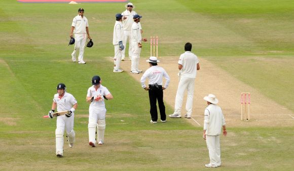 The Indian team appeals for a run-out as England's Ian Bell (left) leaves the field thinking it is tea during the second cricket Test at Trent Bridge in Nottingham